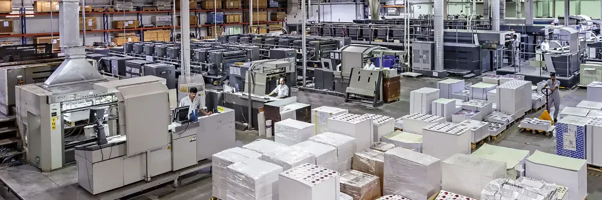 Commercial print production floor used for custom playing card manufacturing