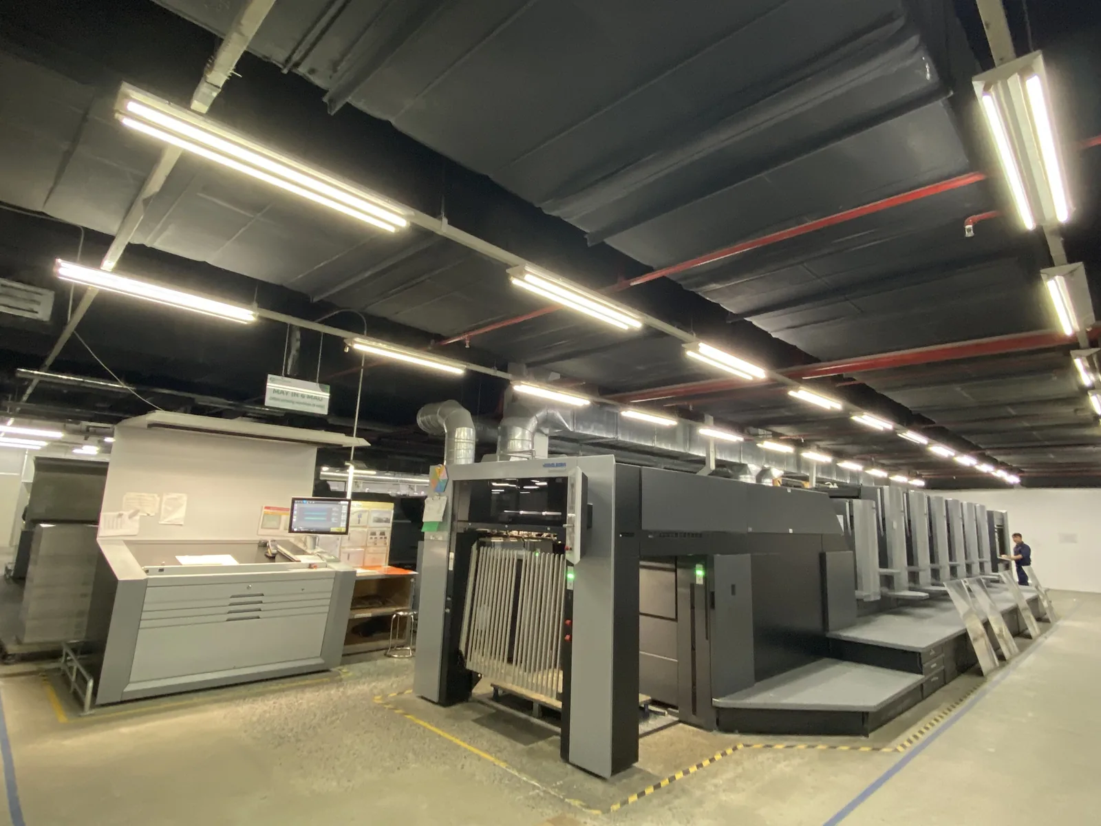 Commercial printing press facility for bulk custom playing card manufacturing