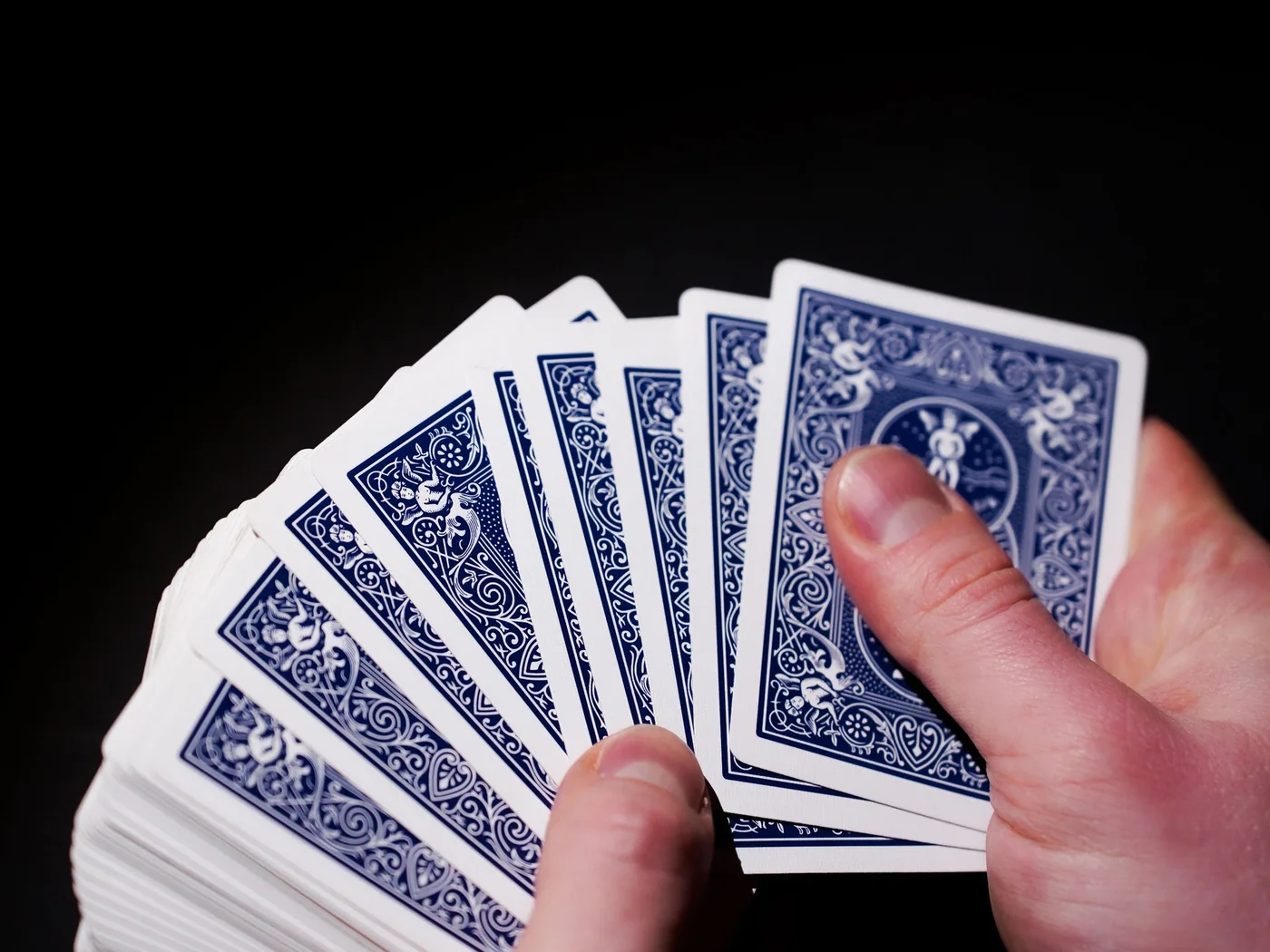 Real fanned playing cards showing printed back detail