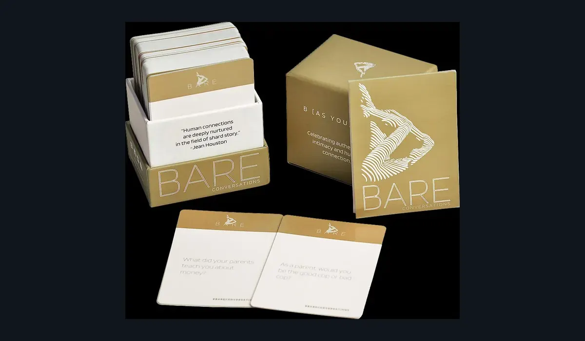 Printed card decks and tuck boxes showing coordinated materials and finishes
